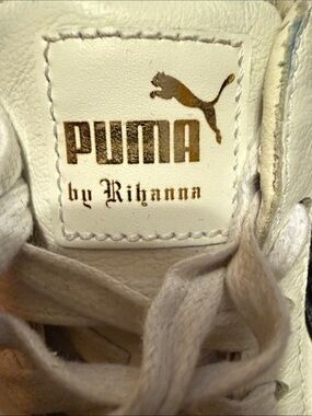 Puma White Sneaker with Gold Logo
